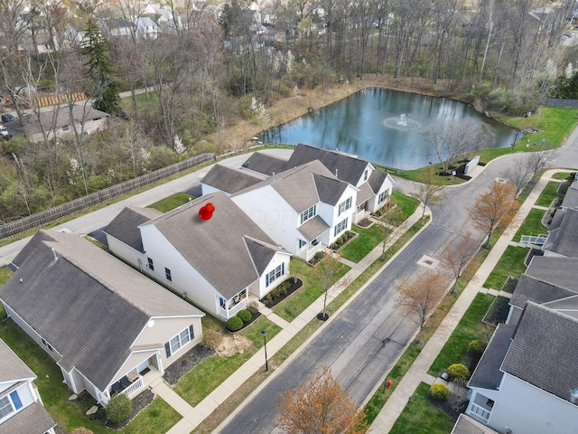 bird's eye view with a water view