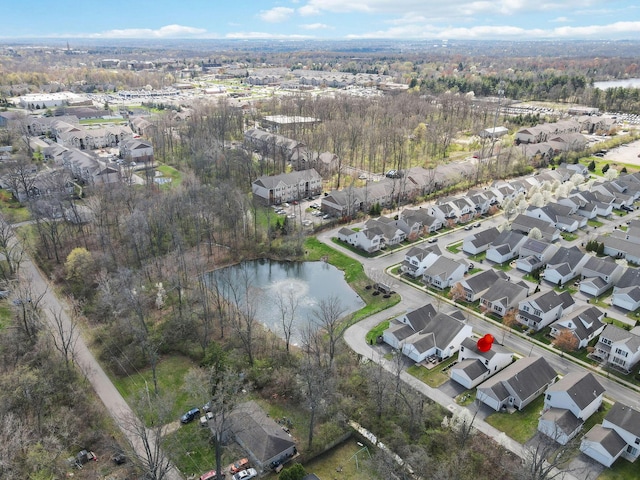 bird's eye view with a water view and a residential view