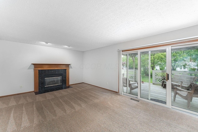 5516 Latrobe St, Westerville, OH 43081 - unfurnished living room featuring carpet floors, baseboards, a textured ceiling, and a tile fireplace