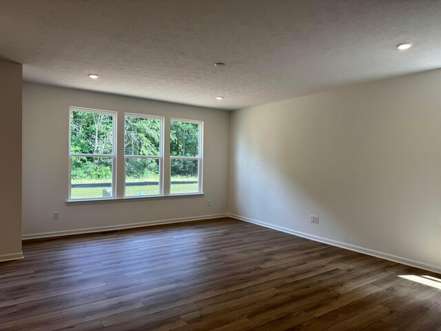 3441 Tender Ave Lot 7157, Powell, OH 43065 - spare room with dark wood finished floors, a textured ceiling, and recessed lighting