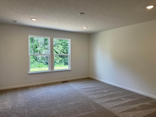 3441 Tender Ave Lot 7157, Powell, OH 43065 - carpeted spare room featuring recessed lighting, a textured ceiling, and a smoke detector