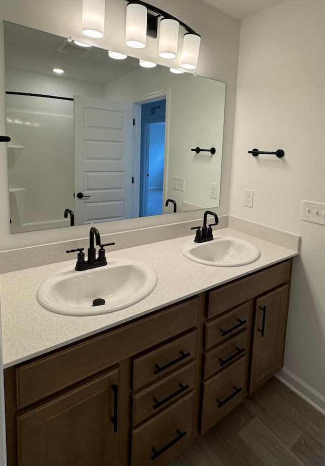3441 Tender Ave Lot 7157, Powell, OH 43065 - full bath with double vanity and wood finished floors