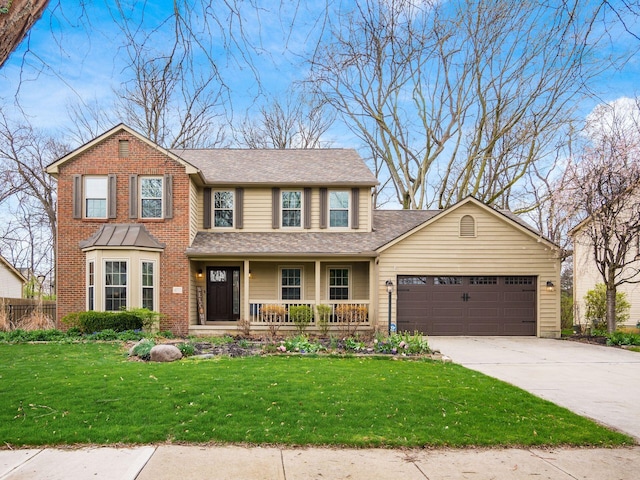 traditional-style home with roof with shingles, driveway, an attached garage, a front lawn, and a porch