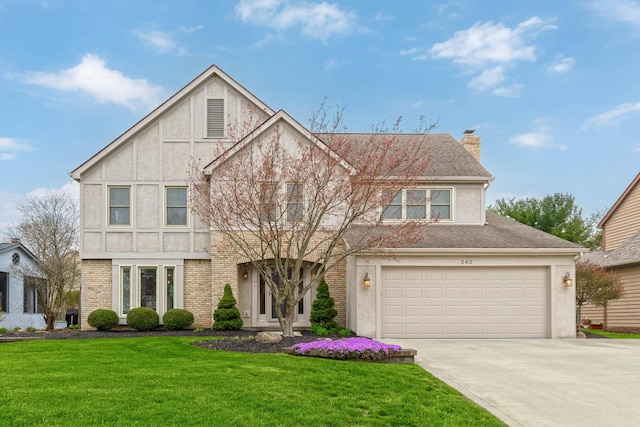 view of front of house with concrete driveway, a front lawn, a chimney, stucco siding, and brick siding