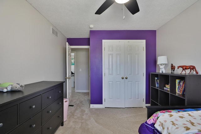 6185 Pollard Place Dr, Hilliard, OH 43026 - bedroom with a closet, baseboards, visible vents, ceiling fan, and light colored carpet