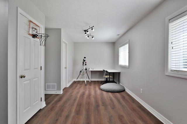 6185 Pollard Place Dr, Hilliard, OH 43026 - misc room featuring dark wood-style flooring, visible vents, a wealth of natural light, and baseboards