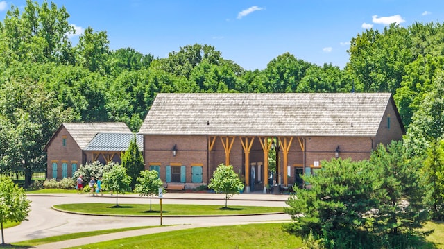 view of community featuring a yard