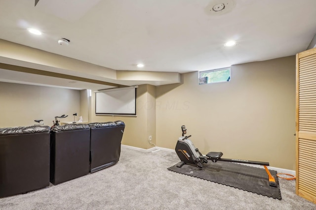 exercise room with recessed lighting, carpet flooring, and baseboards