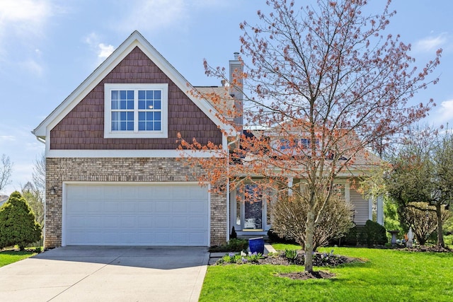 view of front of property featuring a garage, a front yard, brick siding, a chimney, and driveway