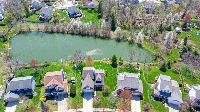 aerial view featuring a residential view and a water view