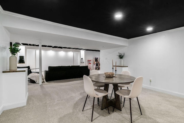 dining area featuring crown molding, baseboards, recessed lighting, and light colored carpet