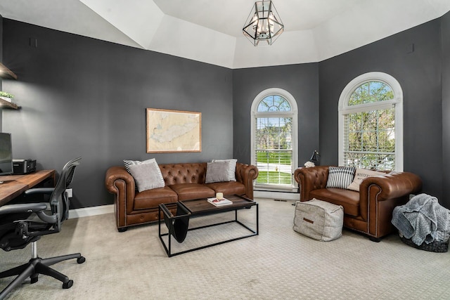 interior space featuring an inviting chandelier and baseboards