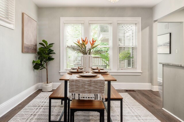 1069 Miller Ave, Columbus, OH 43206 - dining room with dark wood-style floors and baseboards