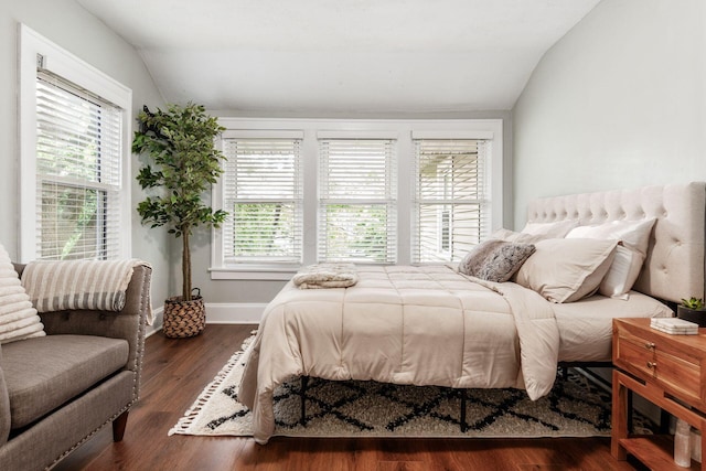 1069 Miller Ave, Columbus, OH 43206 - bedroom featuring vaulted ceiling, dark wood-style floors, and baseboards