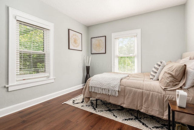 1069 Miller Ave, Columbus, OH 43206 - bedroom featuring dark wood-style floors and baseboards