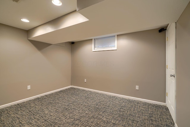 finished basement featuring baseboards, recessed lighting, and carpet