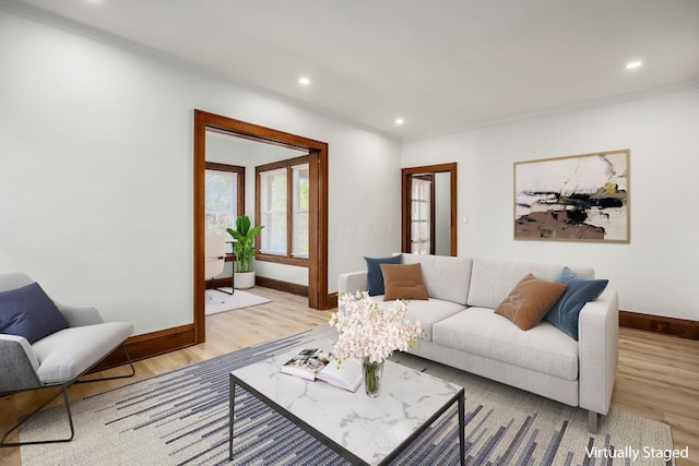 1065-1067 Franklin Ave, Columbus, OH 43205 - living room featuring baseboards, wood finished floors, ornamental molding, and recessed lighting