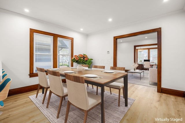 1065-1067 Franklin Ave, Columbus, OH 43205 - dining area with crown molding, baseboards, light wood-style flooring, and recessed lighting