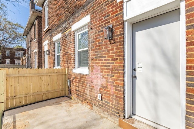 776 S 22nd St Unit 774, Columbus, OH 43206 - doorway to property with brick siding and fence