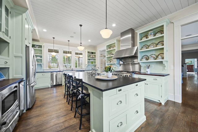 kitchen with a kitchen breakfast bar, wall chimney range hood, open shelves, dark countertops, and stainless steel appliances