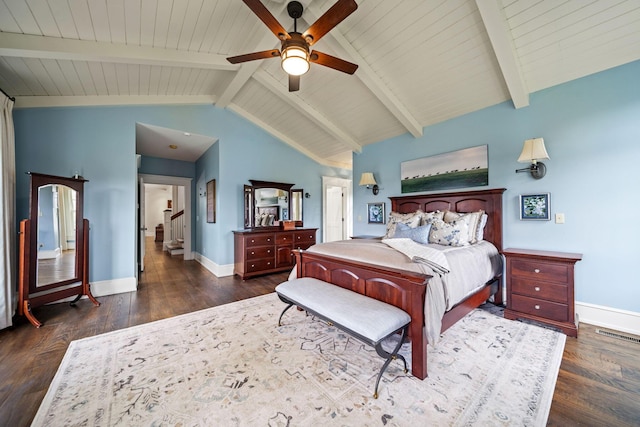 bedroom with visible vents, baseboards, wood finished floors, and lofted ceiling with beams
