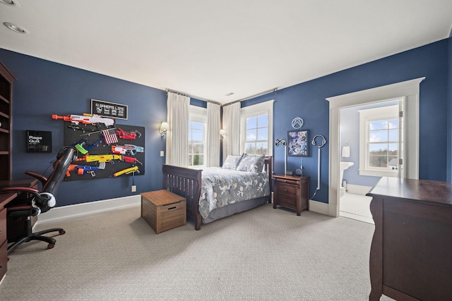 bedroom featuring baseboards and carpet floors