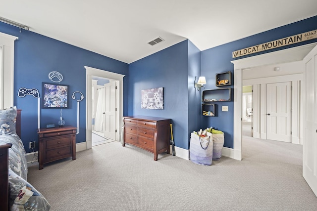 bedroom featuring carpet flooring, baseboards, and visible vents