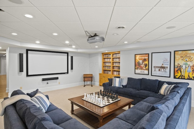 home theater room with baseboards, built in features, recessed lighting, visible vents, and carpet