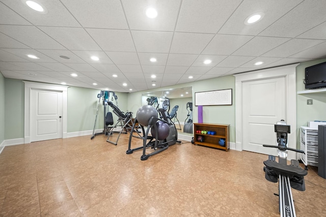 exercise area featuring recessed lighting and baseboards