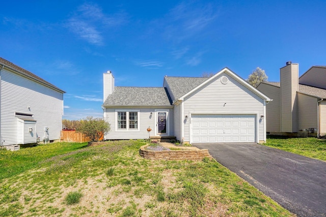 2655 Cross Creek Ave, Lancaster, OH 43130 - traditional home with driveway, a front lawn, a chimney, and an attached garage