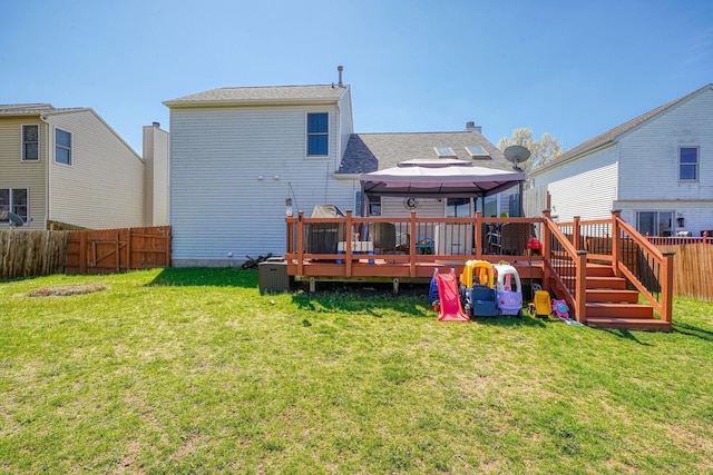 2655 Cross Creek Ave, Lancaster, OH 43130 - rear view of house with a gazebo, a wooden deck, a fenced backyard, and a lawn