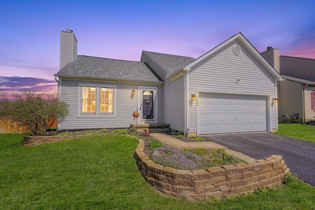2655 Cross Creek Ave, Lancaster, OH 43130 - view of front of home with a garage, a chimney, a lawn, driveway, and roof with shingles