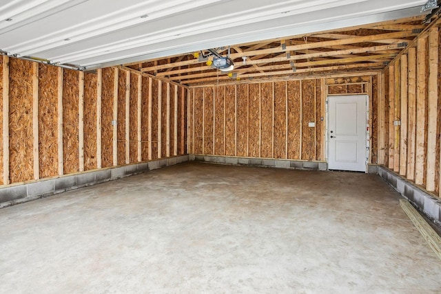 garage featuring a garage door opener