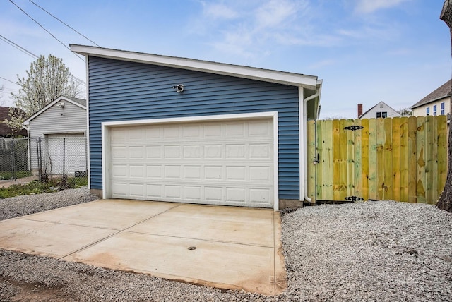 detached garage with fence