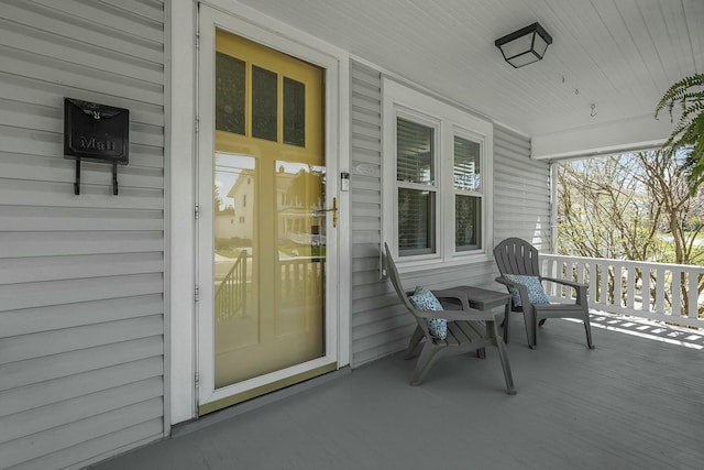 entrance to property with covered porch