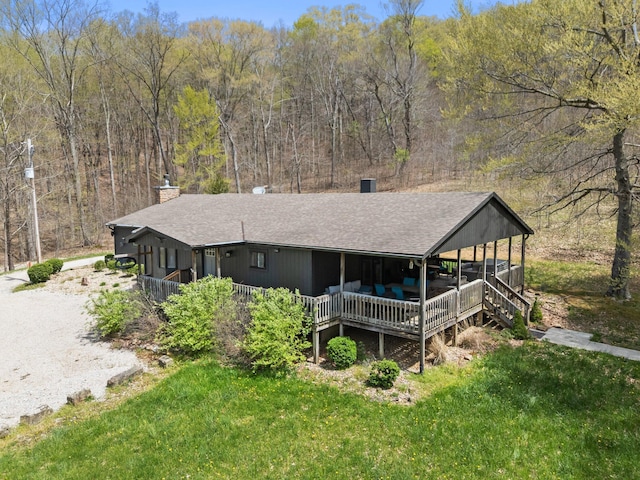 19990 Sowers Rd, Laurelville, OH 43135 - rear view of property with a chimney, a yard, a shingled roof, and a forest view