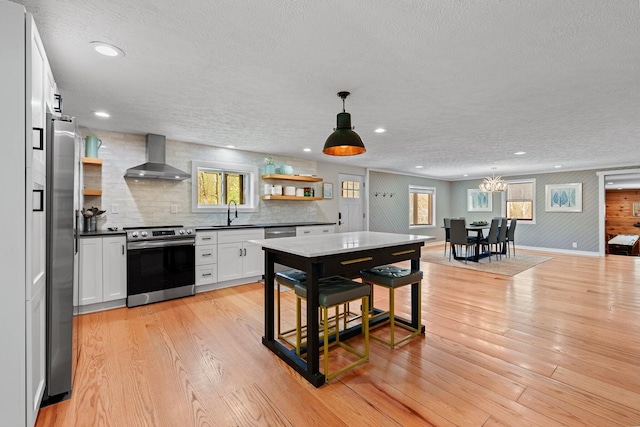 19990 Sowers Rd, Laurelville, OH 43135 - kitchen with a textured ceiling, stainless steel appliances, open shelves, and wall chimney exhaust hood