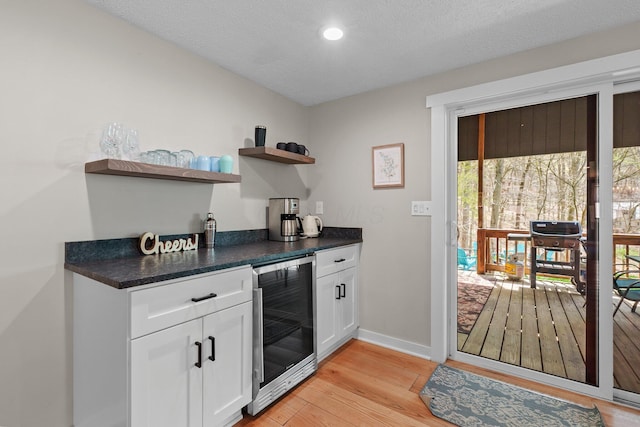 19990 Sowers Rd, Laurelville, OH 43135 - bar with beverage cooler, recessed lighting, light wood-style flooring, and baseboards