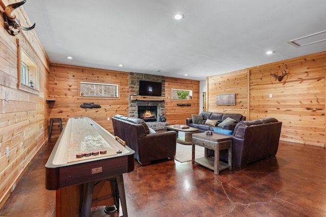 19990 Sowers Rd, Laurelville, OH 43135 - living room with wood walls, a fireplace, finished concrete flooring, and recessed lighting