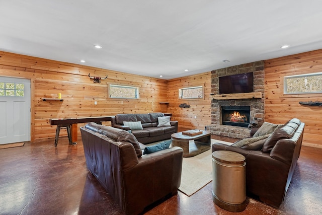 19990 Sowers Rd, Laurelville, OH 43135 - living area featuring a fireplace, wooden walls, recessed lighting, and concrete flooring