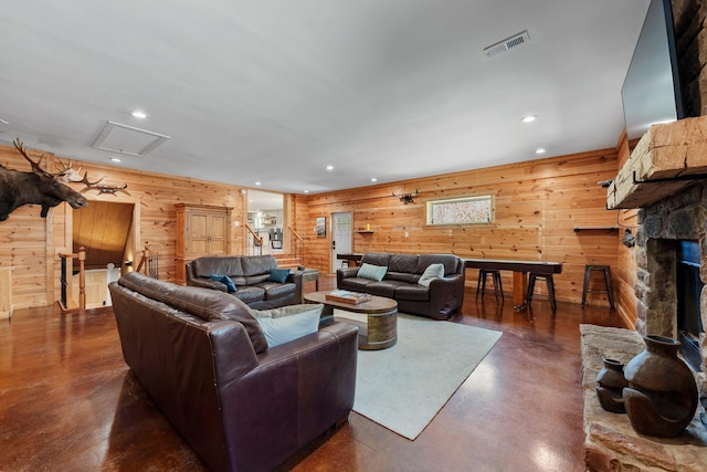19990 Sowers Rd, Laurelville, OH 43135 - living area featuring finished concrete flooring, wood walls, visible vents, recessed lighting, and a fireplace