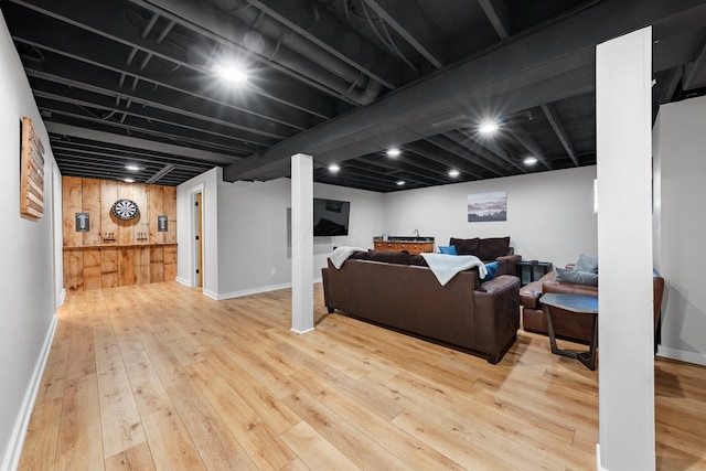 19990 Sowers Rd, Laurelville, OH 43135 - living room featuring wood walls, baseboards, and wood-type flooring