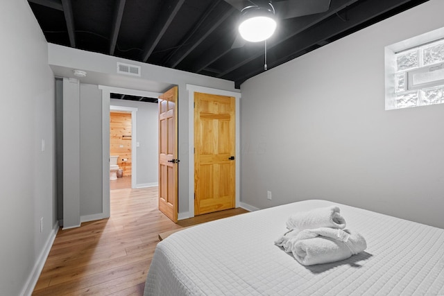 19990 Sowers Rd, Laurelville, OH 43135 - bedroom with baseboards, visible vents, and light wood finished floors