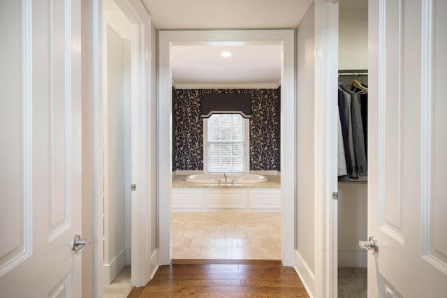 2 Albery Loop, New Albany, OH 43054 - full bath featuring wallpapered walls, a spacious closet, crown molding, and wood finished floors