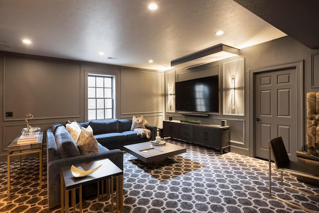 2 Albery Loop, New Albany, OH 43054 - living room featuring a decorative wall, visible vents, and recessed lighting