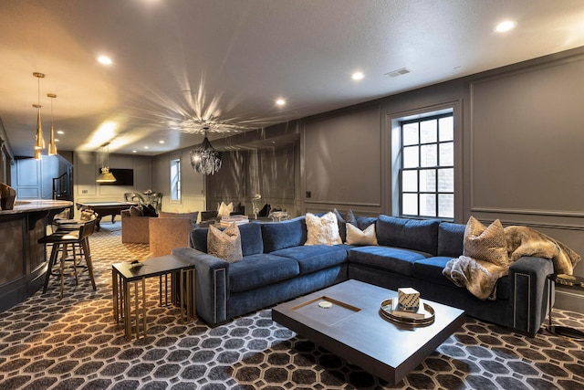 2 Albery Loop, New Albany, OH 43054 - living area featuring recessed lighting, stone floors, and a decorative wall