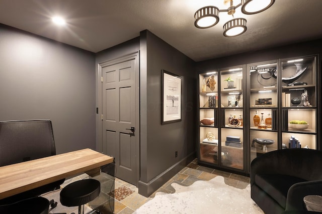 2 Albery Loop, New Albany, OH 43054 - office area featuring baseboards and stone tile flooring