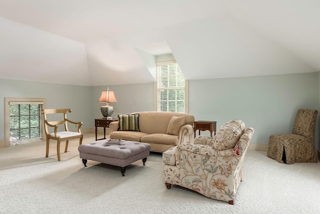 2 Albery Loop, New Albany, OH 43054 - living room featuring light carpet, a wealth of natural light, baseboards, and lofted ceiling