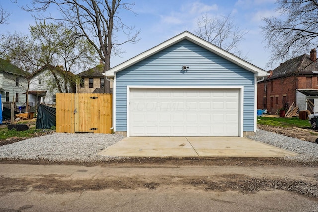 detached garage with fence