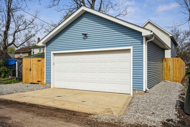 garage featuring fence